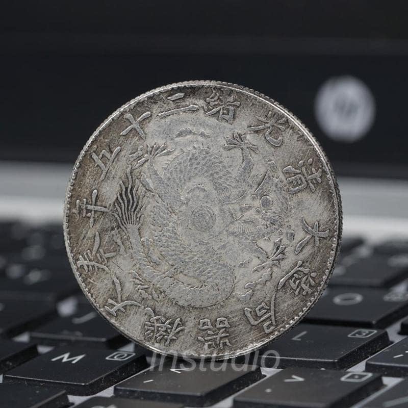 Фэнтяньский сребърен Ян Гуансюлун Двадесет и пет години на океана Луньян Сребърна монета в Древна монета Гуансюй Юаньбао, Изработени